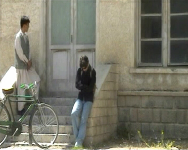 Rahraw Omarzad/CCAA
<br>Still from <em>Closed Door</em>, 2004-2005
<br>Video