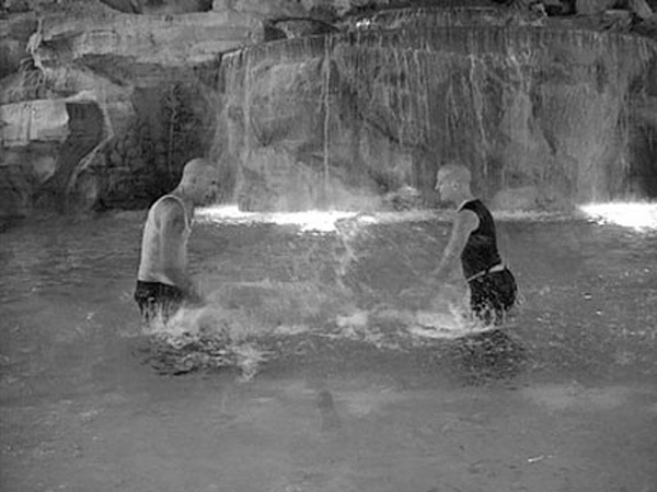 Sislej Xhafa
<br><em>Skinheads Swimming</em>, 2002, Video
<br>Duration: 4:00
<br>Courtesy of the artist