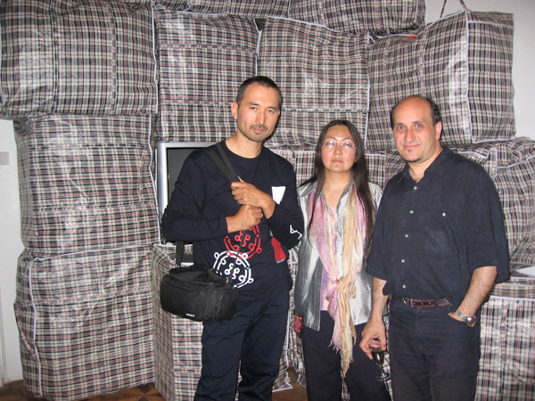 Gulnara Kasmalieva & Muratbek Djumaliev in front of their Installation <i>Transiberian Amazons<i>
<br>Central Asia Pavilion
<br>Venice Biennial, 2005